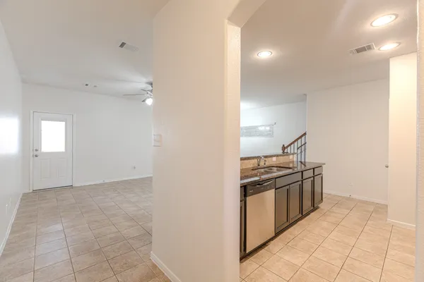a view of a kitchen with a sink