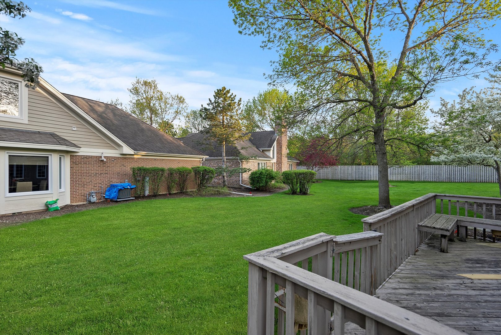 341 Rivershire Court Lincolnshire, IL 60069 - Photo 30 of 32 a view of a house with backyard and sitting area