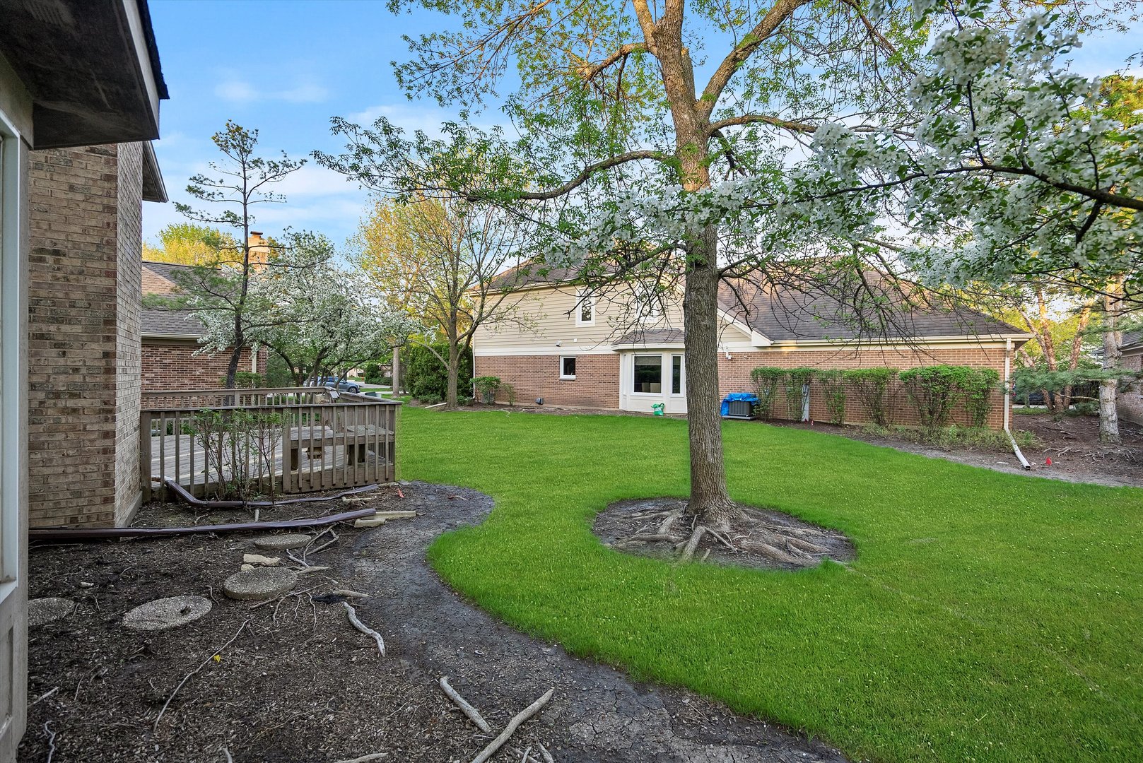341 Rivershire Court Lincolnshire, IL 60069 - Photo 32 of 32 a view of a house with backyard and sitting area
