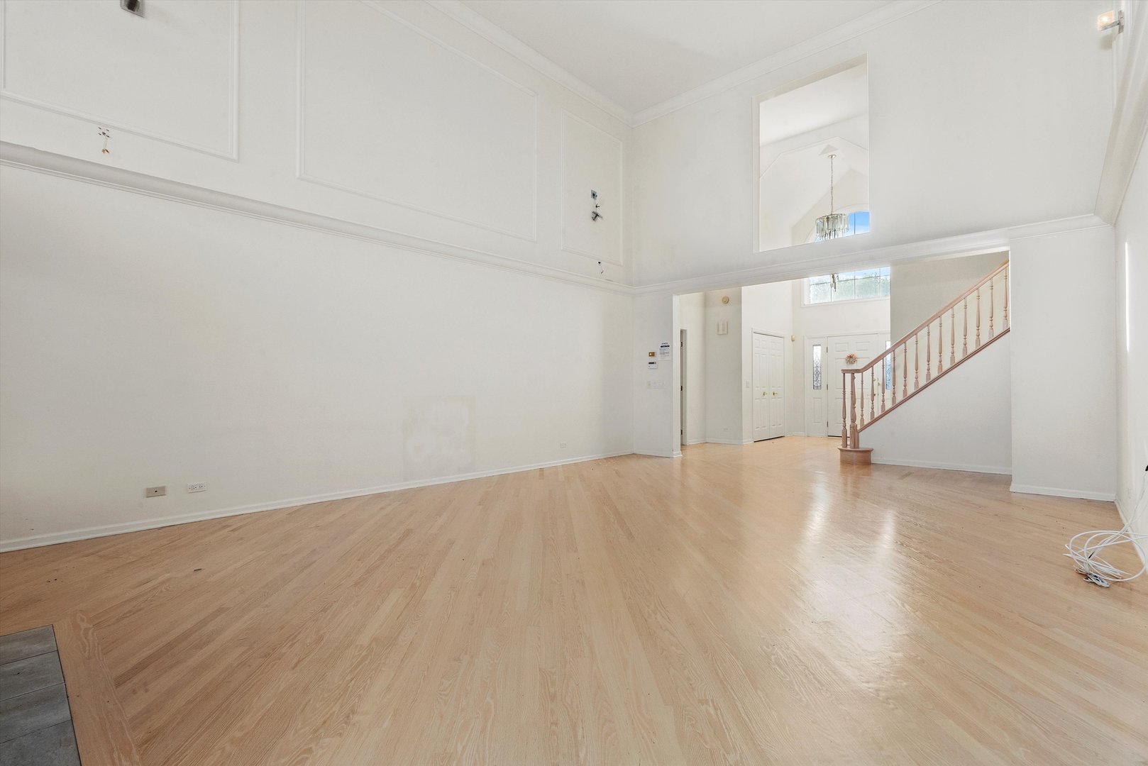 341 Rivershire Court Lincolnshire, IL 60069 - Photo 8 of 32 a view of empty room with wooden floor
