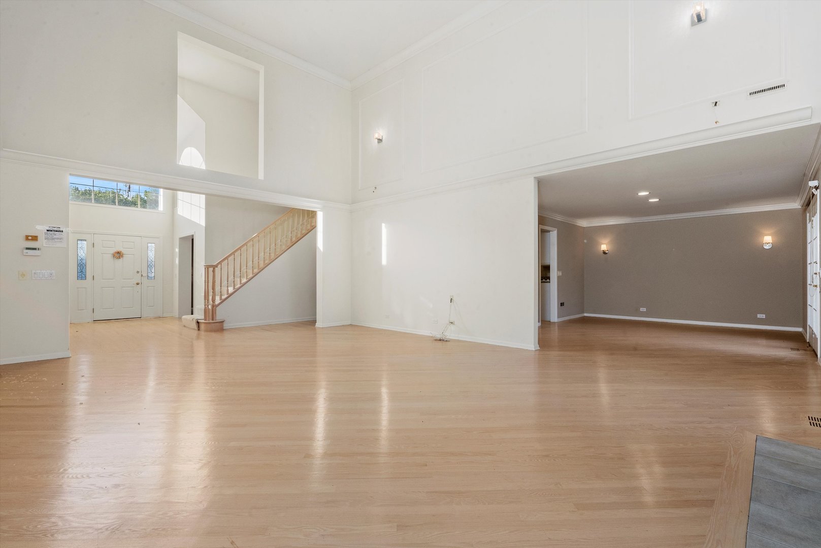 341 Rivershire Court Lincolnshire, IL 60069 - Photo 9 of 32 a view of an empty room with wooden floor