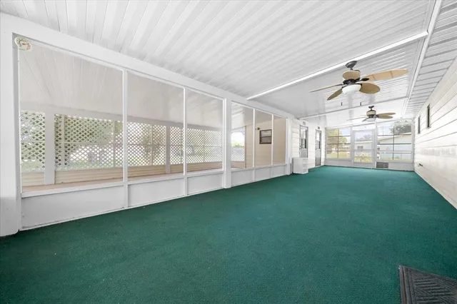 a view of a porch with a backyard