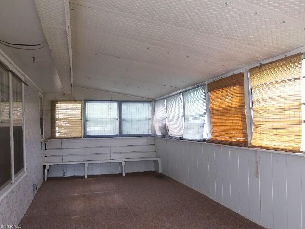 1058 Copeland School Road Dobson, NC 27017 - Photo 13 of 22 Enclosed back porch or Sunroom