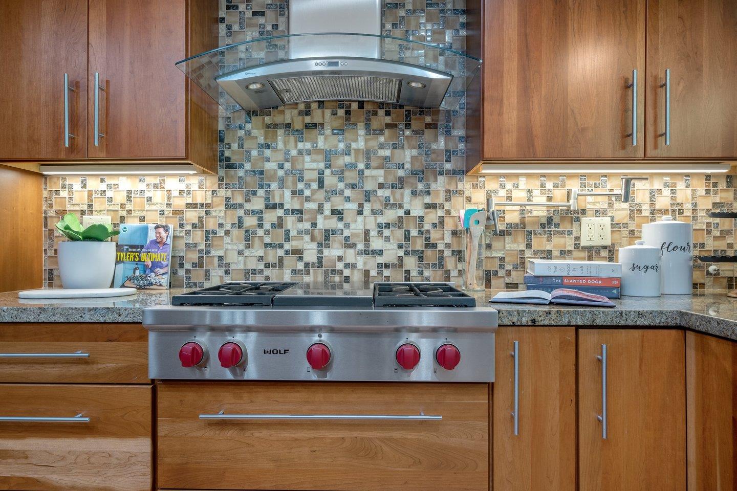 603 Cornwallis Lane Foster City, CA 94404 - Photo 11 of 36 a kitchen with stainless steel appliances granite countertop a stove and cabinets