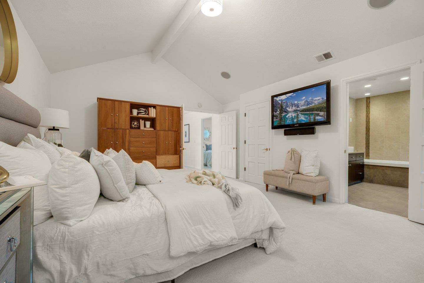 603 Cornwallis Lane Foster City, CA 94404 - Photo 16 of 36 a bedroom with a bed and a flat screen tv