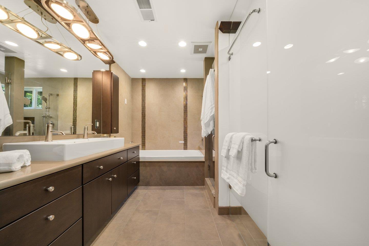 603 Cornwallis Lane Foster City, CA 94404 - Photo 18 of 36 a bathroom with a sink a toilet and shower