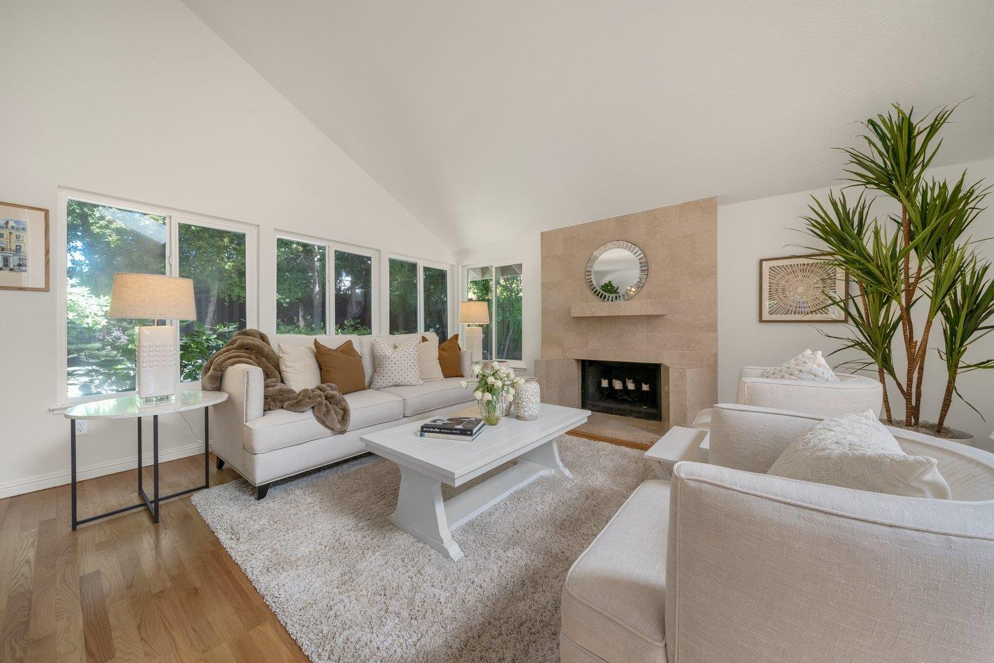 603 Cornwallis Lane Foster City, CA 94404 - Photo 3 of 36 a living room with furniture and a fireplace
