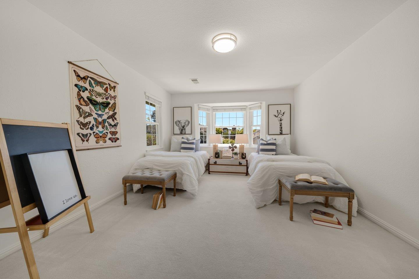 603 Cornwallis Lane Foster City, CA 94404 - Photo 27 of 36 a bedroom with furniture and a large window