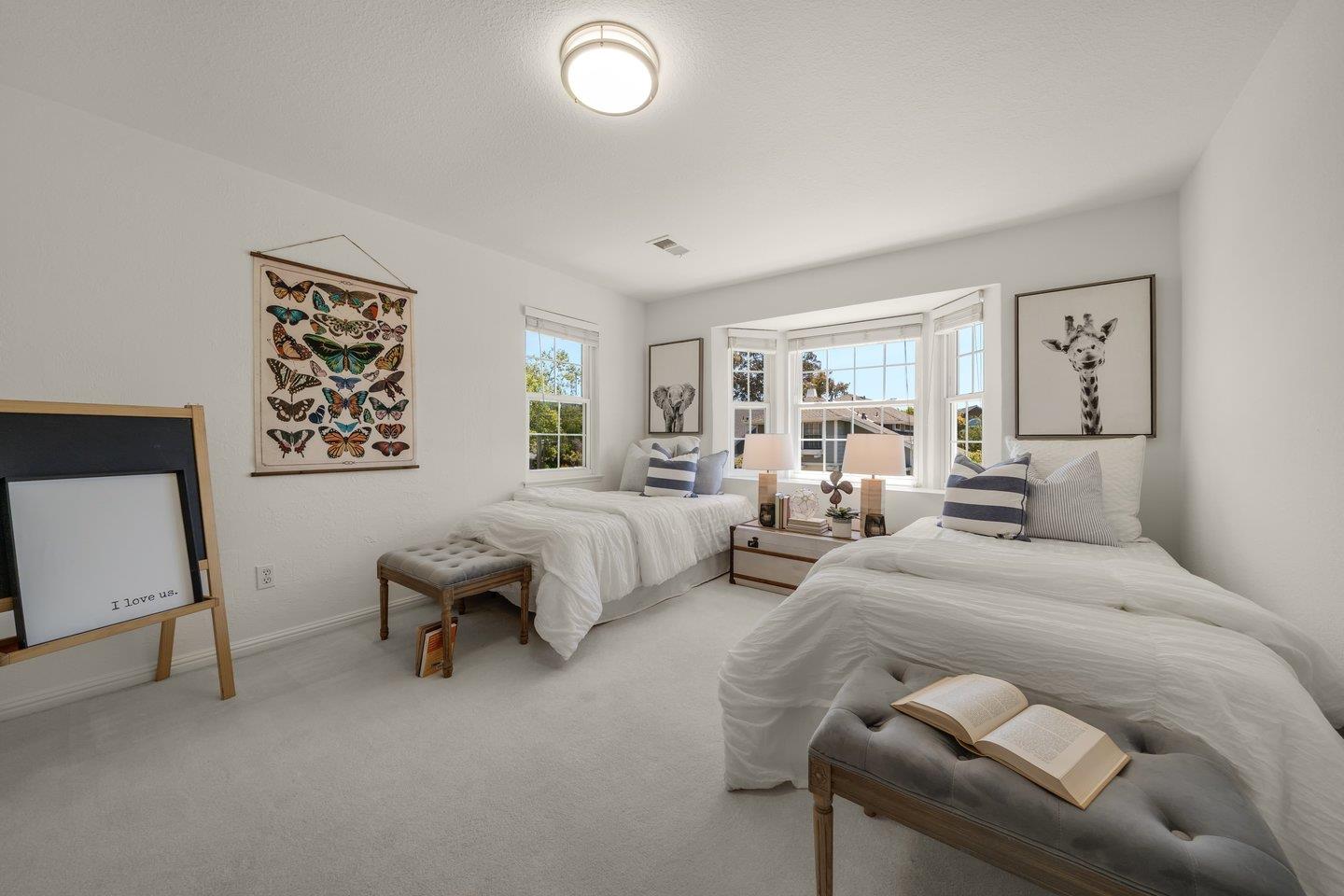 603 Cornwallis Lane Foster City, CA 94404 - Photo 28 of 36 a bedroom with a bed and a couch