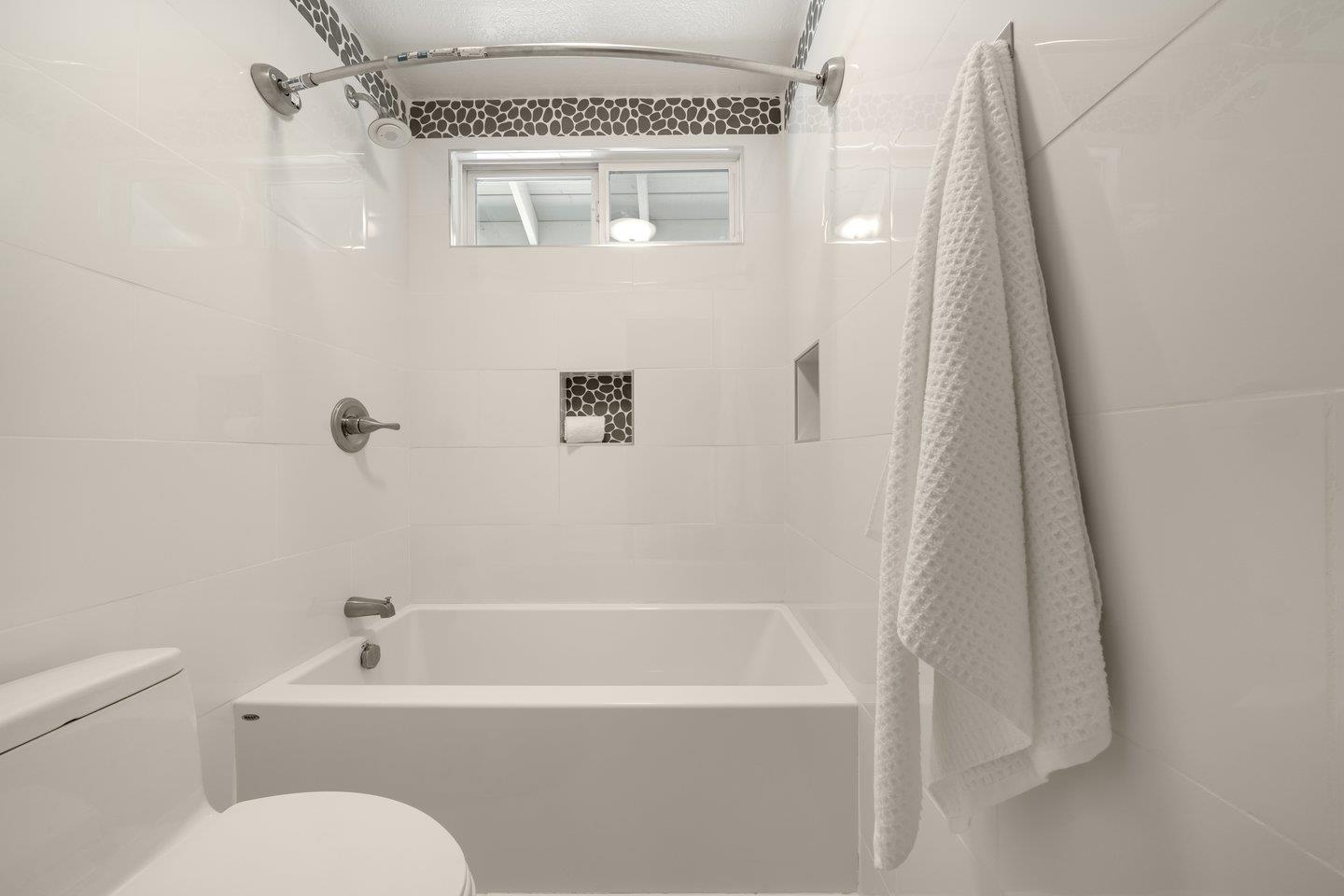 603 Cornwallis Lane Foster City, CA 94404 - Photo 30 of 36 a bathroom with a toilet a sink and bathtub