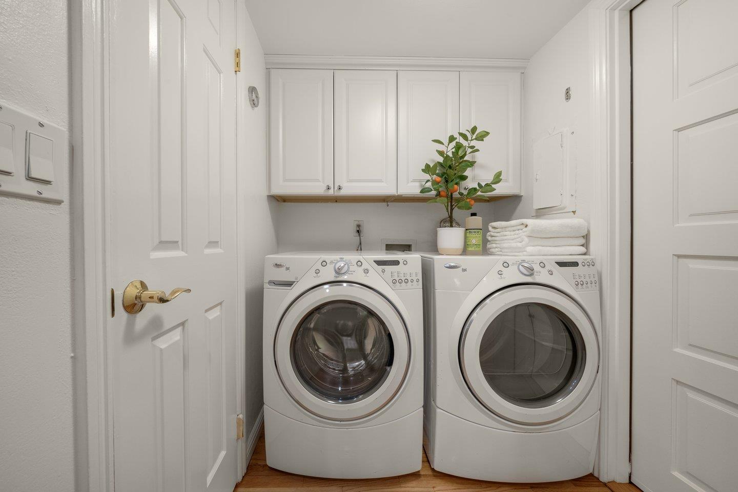 603 Cornwallis Lane Foster City, CA 94404 - Photo 31 of 36 a view of a hallway with washer and dryer