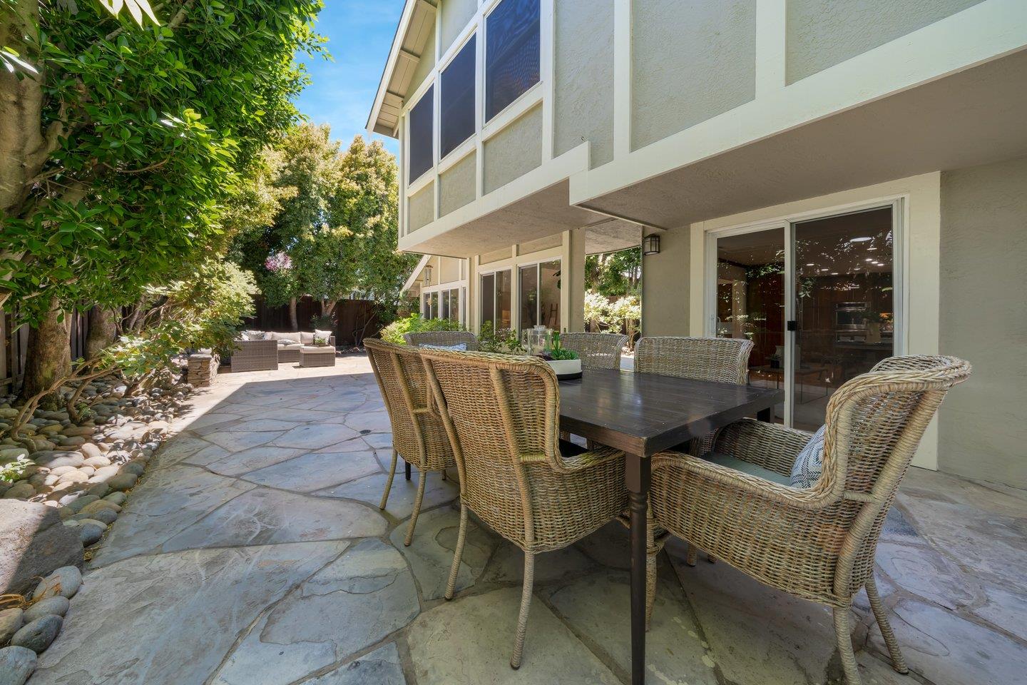 603 Cornwallis Lane Foster City, CA 94404 - Photo 33 of 36 a view of a patio with couches table and chairs and potted plants
