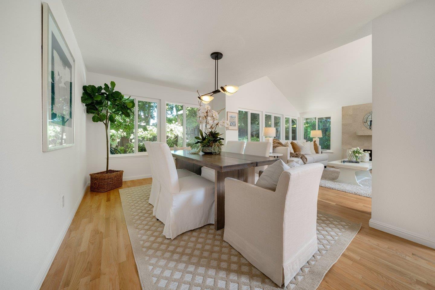 603 Cornwallis Lane Foster City, CA 94404 - Photo 5 of 36 a living room with furniture and a chandelier