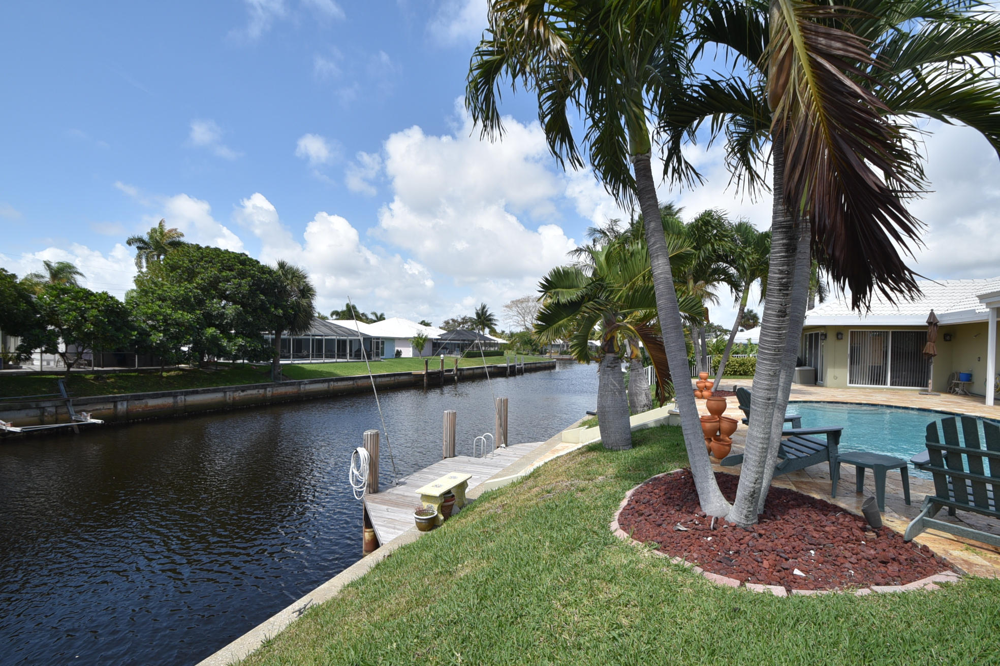 736 Apple Tree Lane Boca Raton, FL 33486 - Photo 27 of 43 a view of a house with a yard balcony and sitting area