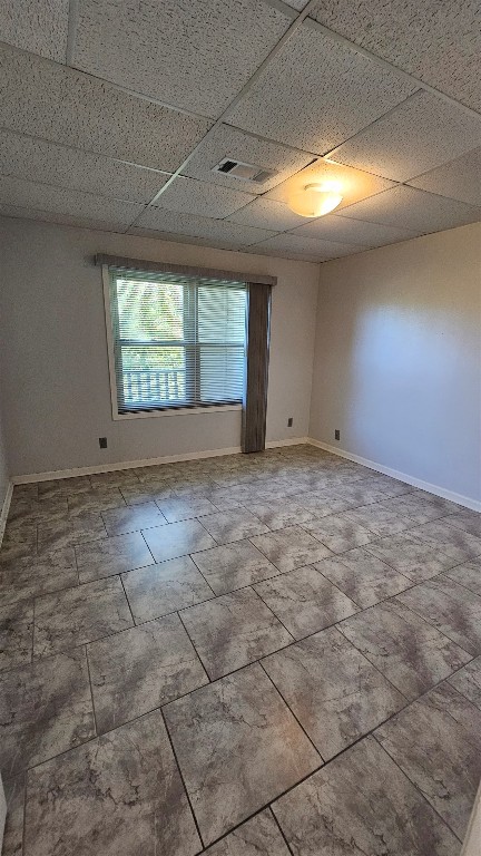 170 Interstate Drive, Unit B Buda, TX 78610 - Photo 7 of 11 a view of an empty room and window