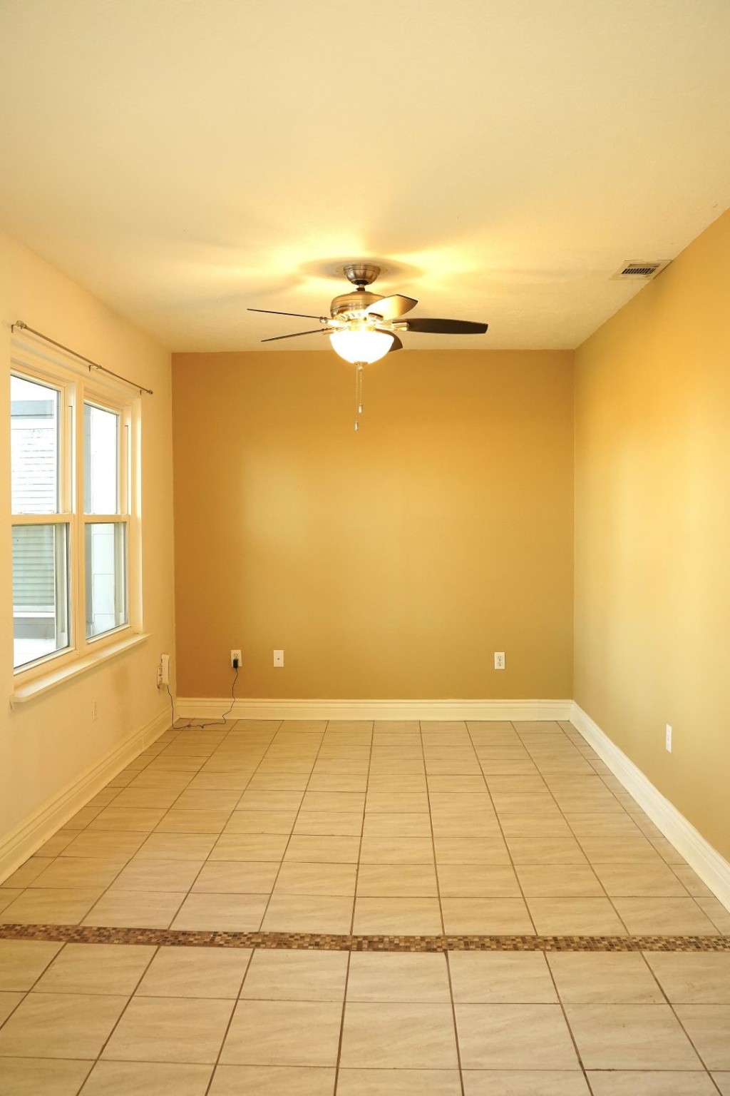 1202 Mac Drive Sweeny, TX 77480 - Photo 6 of 12 a view of an empty room and window