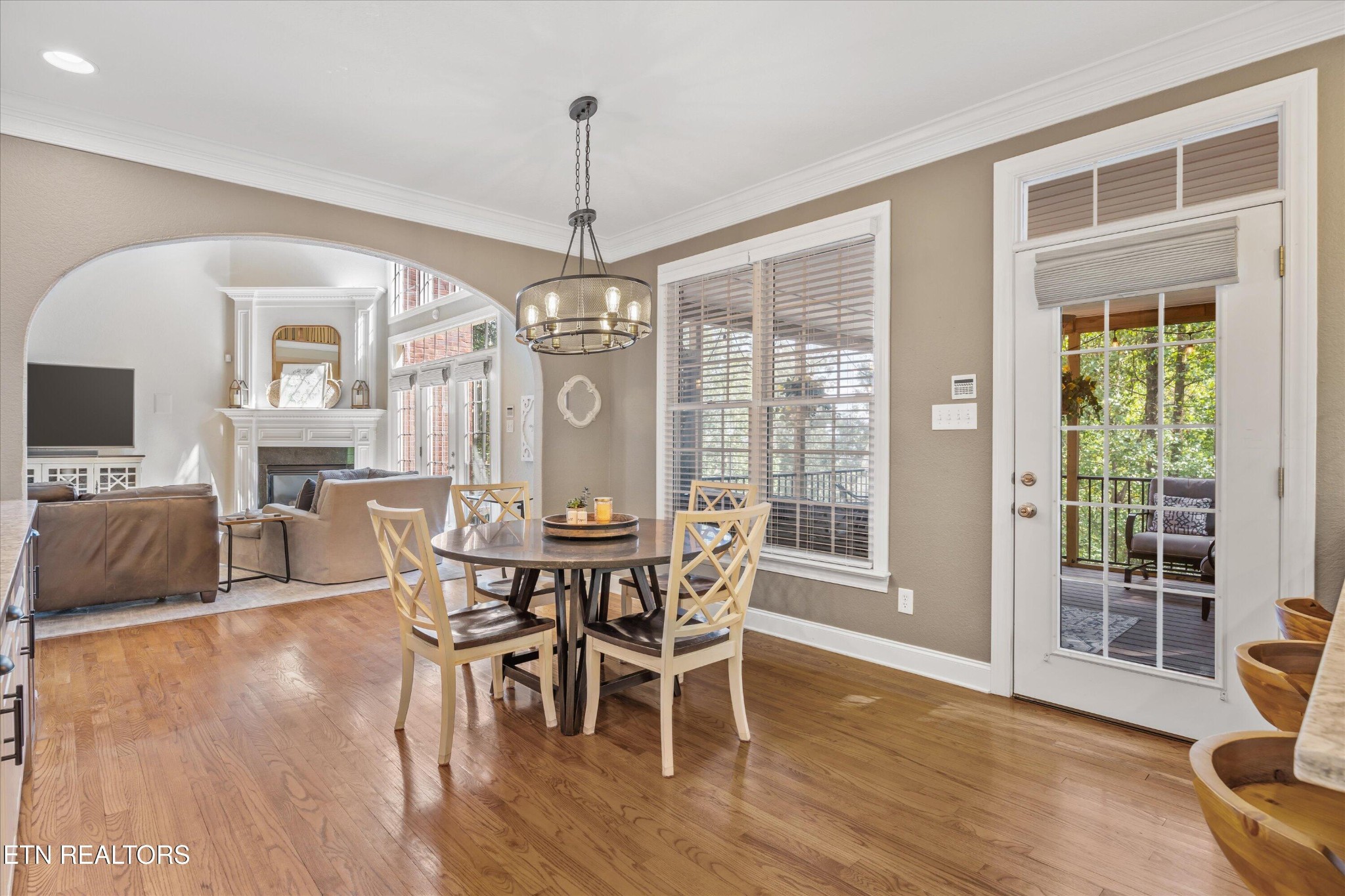 12820 High Oak Road Knoxville, TN 37934 - Photo 11 of 60 a view of a dining room with furniture window and wooden floor
