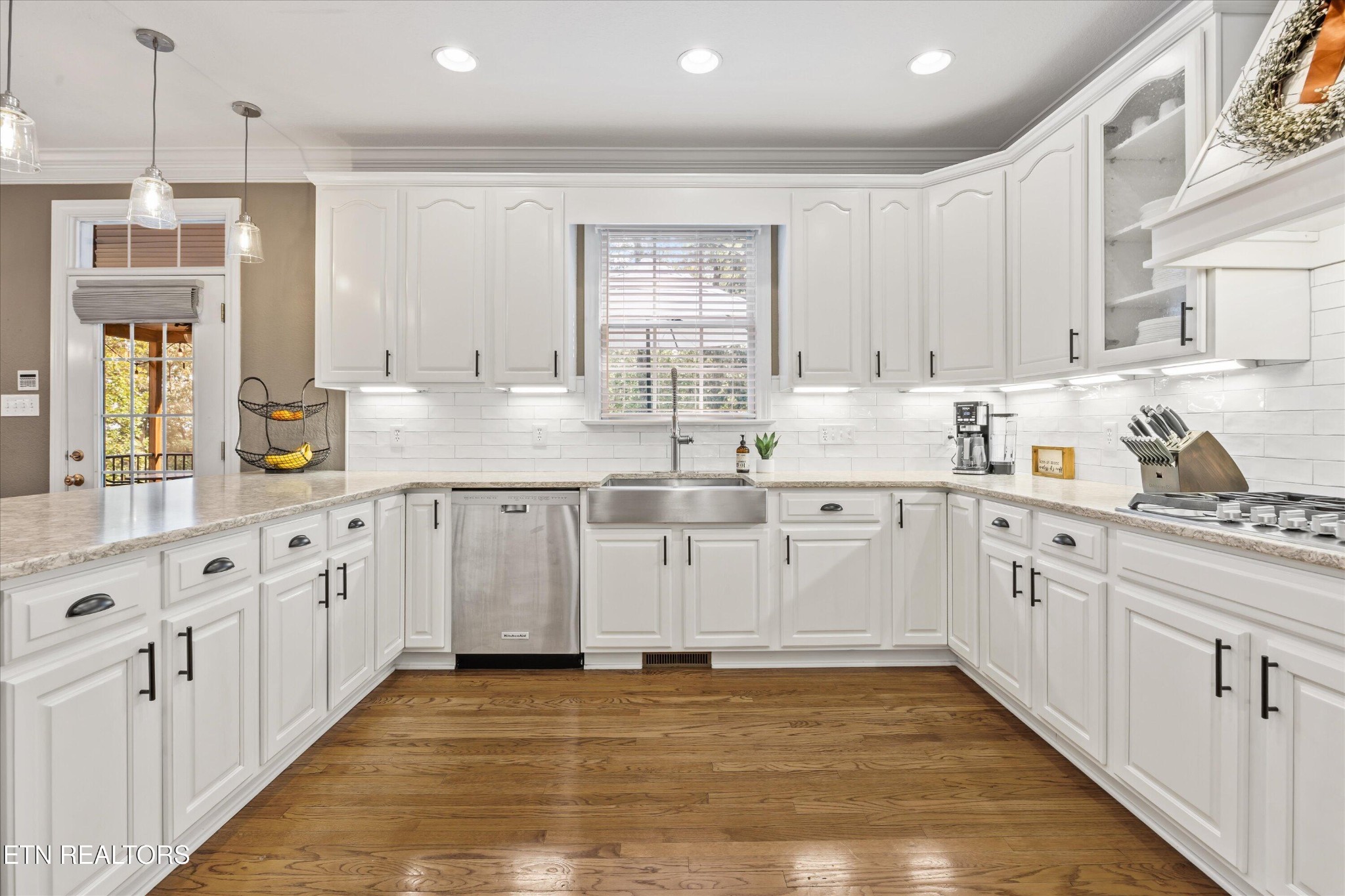 12820 High Oak Road Knoxville, TN 37934 - Photo 14 of 60 a kitchen with granite countertop white cabinets white stainless steel appliances with a sink and dishwasher