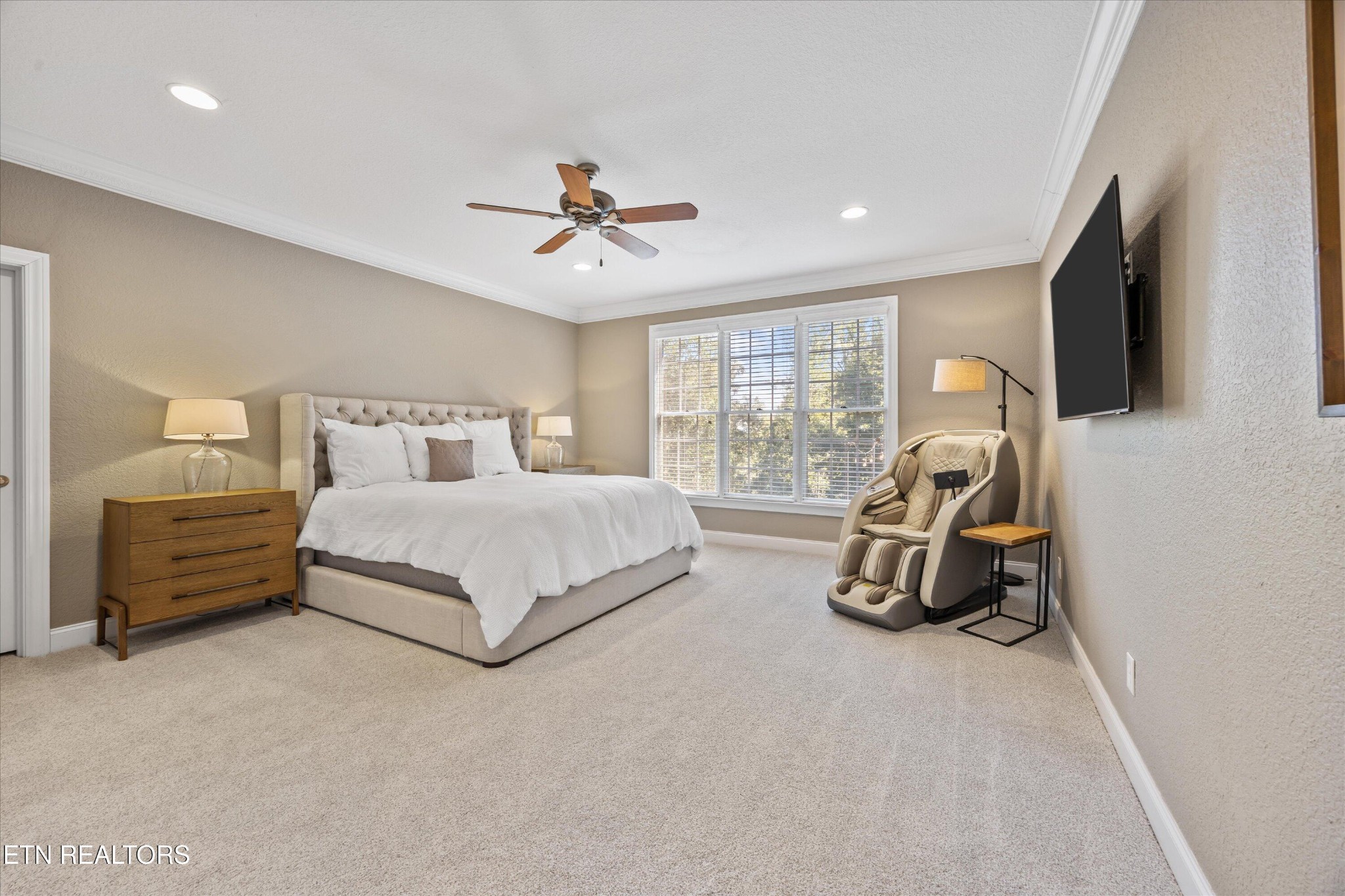 12820 High Oak Road Knoxville, TN 37934 - Photo 16 of 60 a bedroom with a bed a flat screen tv and a couch