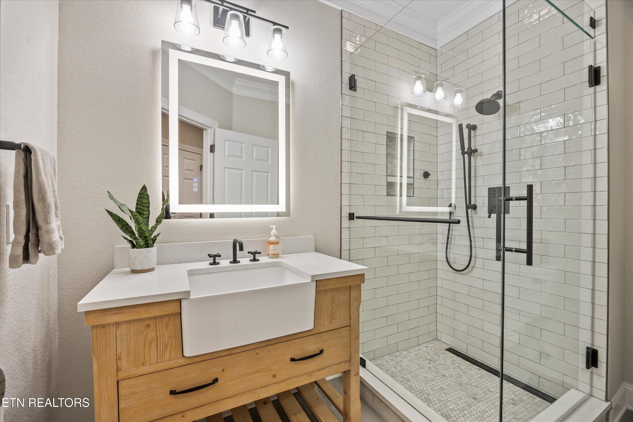 12820 High Oak Road Knoxville, TN 37934 - Photo 21 of 60 a bathroom with a sink vanity granite and shower