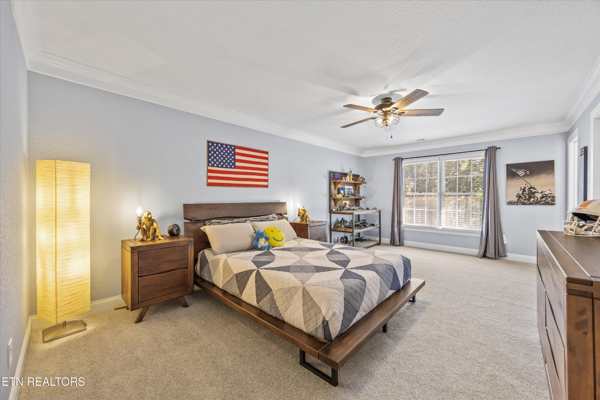 12820 High Oak Road Knoxville, TN 37934 - Photo 29 of 60 a bedroom with a bed and a chandelier