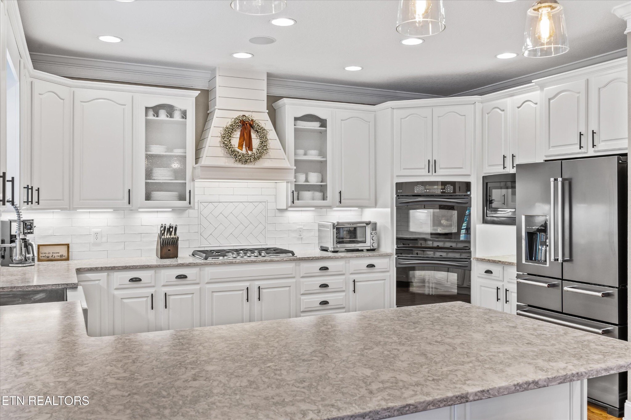 12820 High Oak Road Knoxville, TN 37934 - Photo 3 of 60 a kitchen with stainless steel appliances granite countertop a refrigerator and a stove