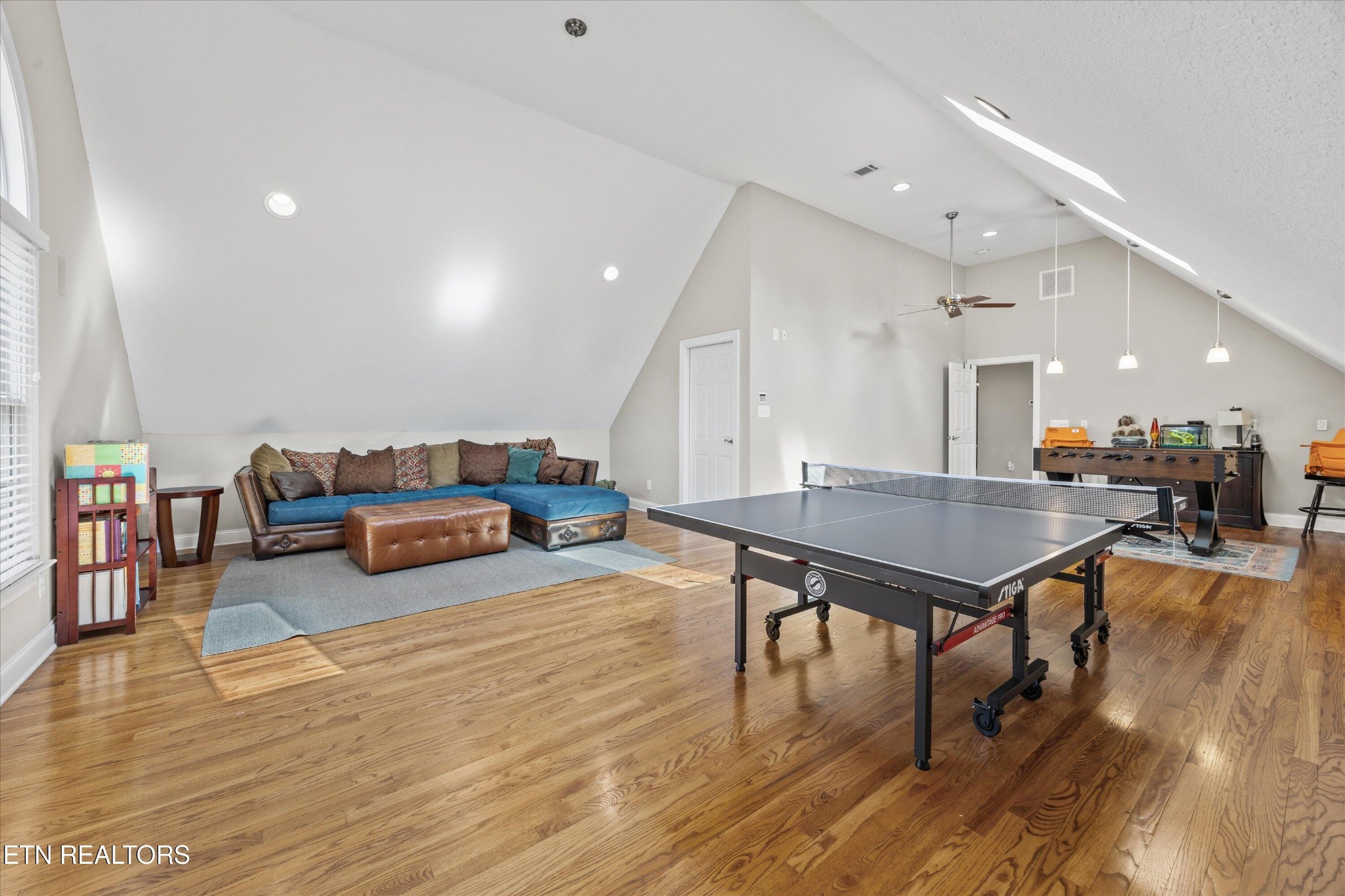 12820 High Oak Road Knoxville, TN 37934 - Photo 31 of 60 a living room with furniture and a wooden floor