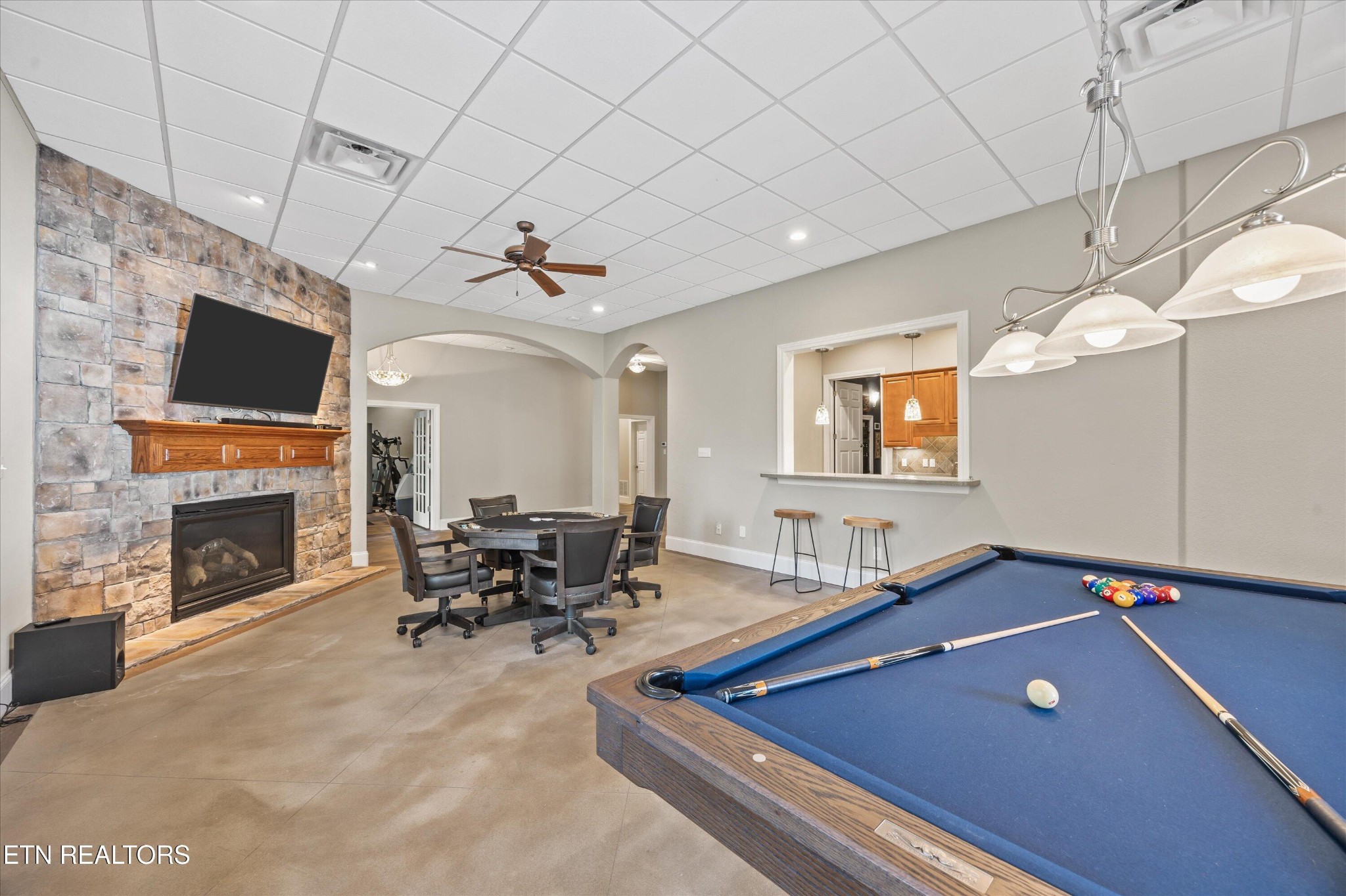 12820 High Oak Road Knoxville, TN 37934 - Photo 36 of 60 a living room with fireplace furniture and a flat screen tv