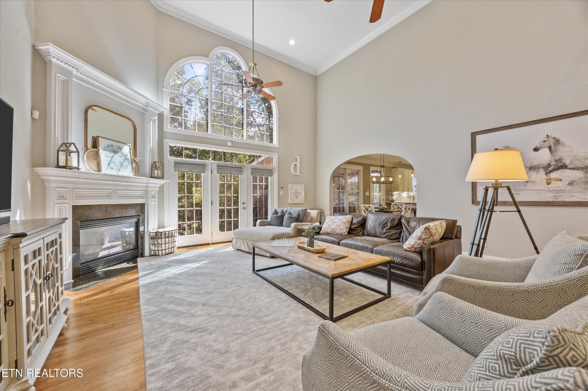 12820 High Oak Road Knoxville, TN 37934 - Photo 4 of 60 a living room with furniture chandelier and a fireplace