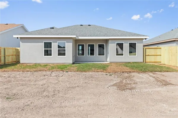a front view of house with yard