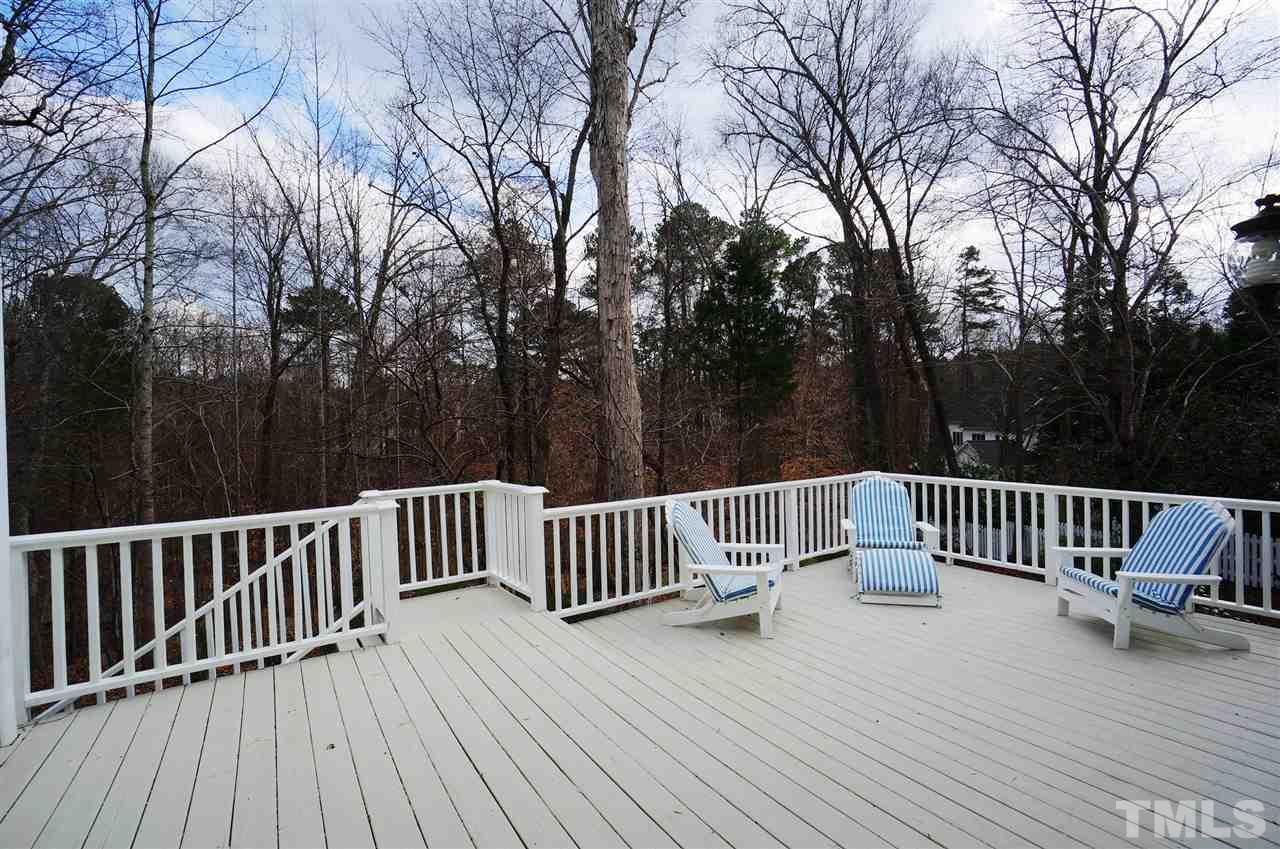 204 Veranda Court Raleigh, NC 27615 - Photo 24 of 25 Back Deck is accessible via Breakfast Area & Sun Rm.