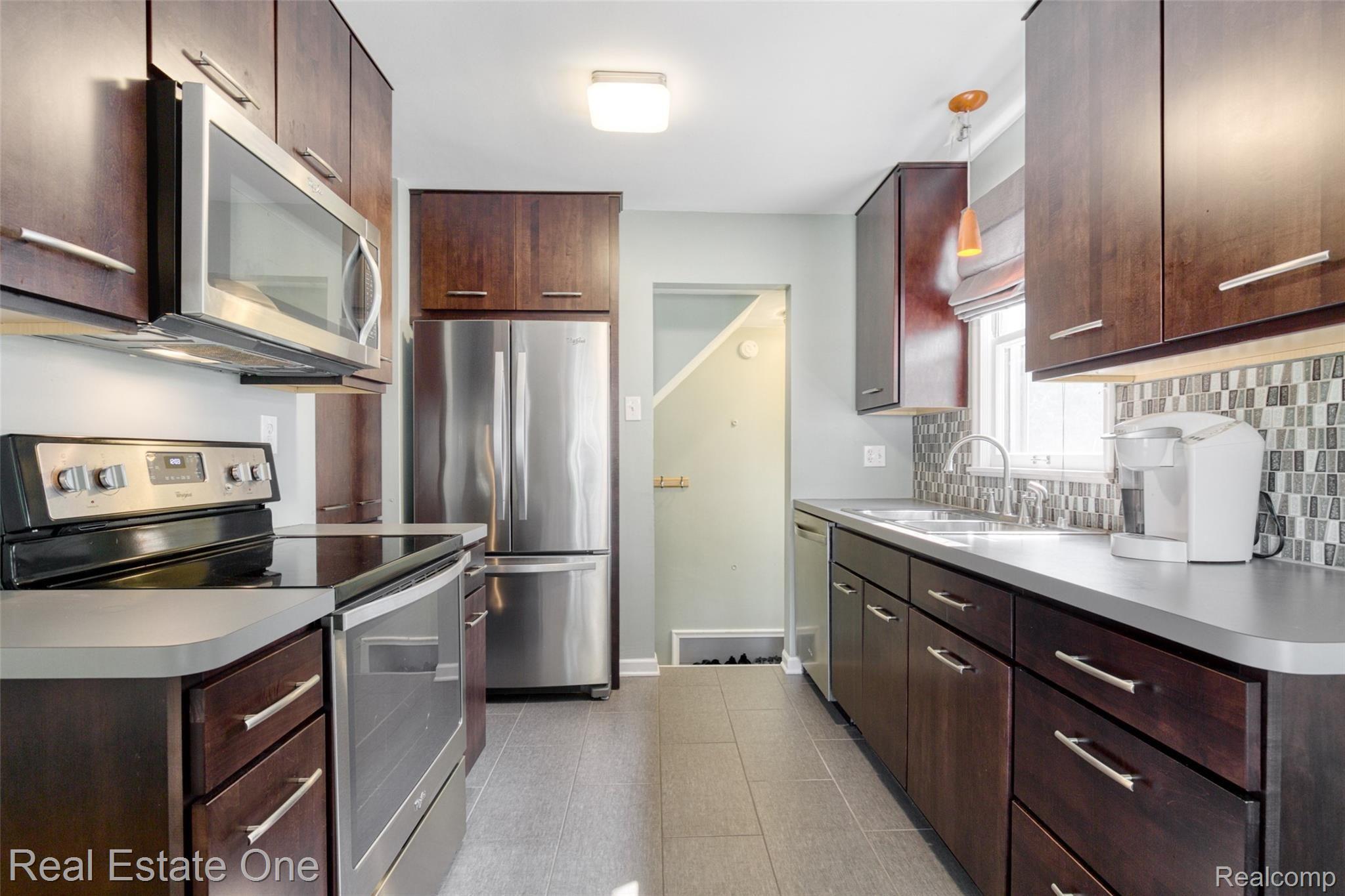 3608 Durham Road Royal Oak, MI 48073 - Photo 8 of 23 Custom cabinetry, ceramic tile floor & stainless steel appliances!