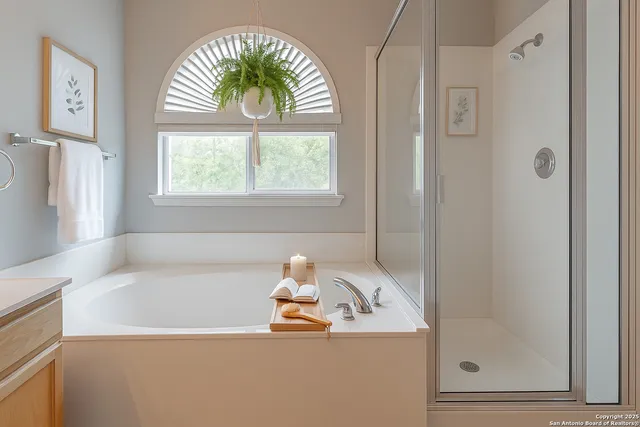 a bath tub sitting next to a window