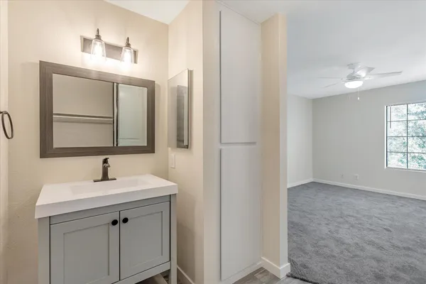 a bathroom with a shower and a toilet