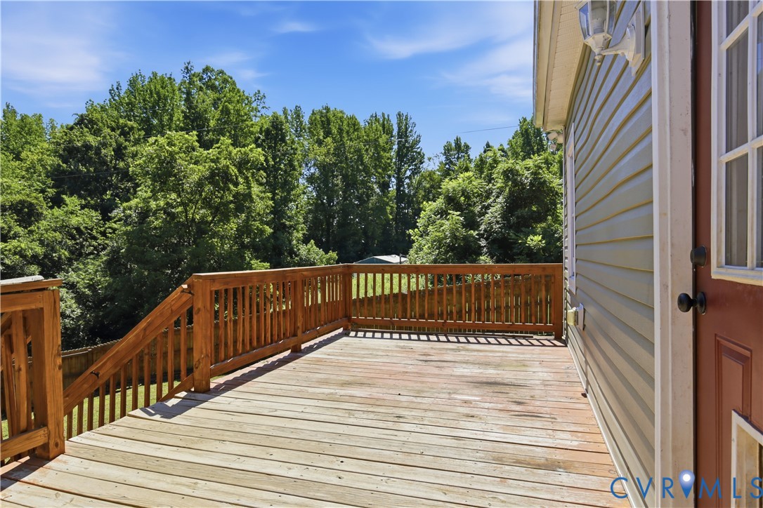 36 Columbia Road Cartersville, VA 23027 - Photo 26 of 35 Expansive wood deck with a natural finish, featuri