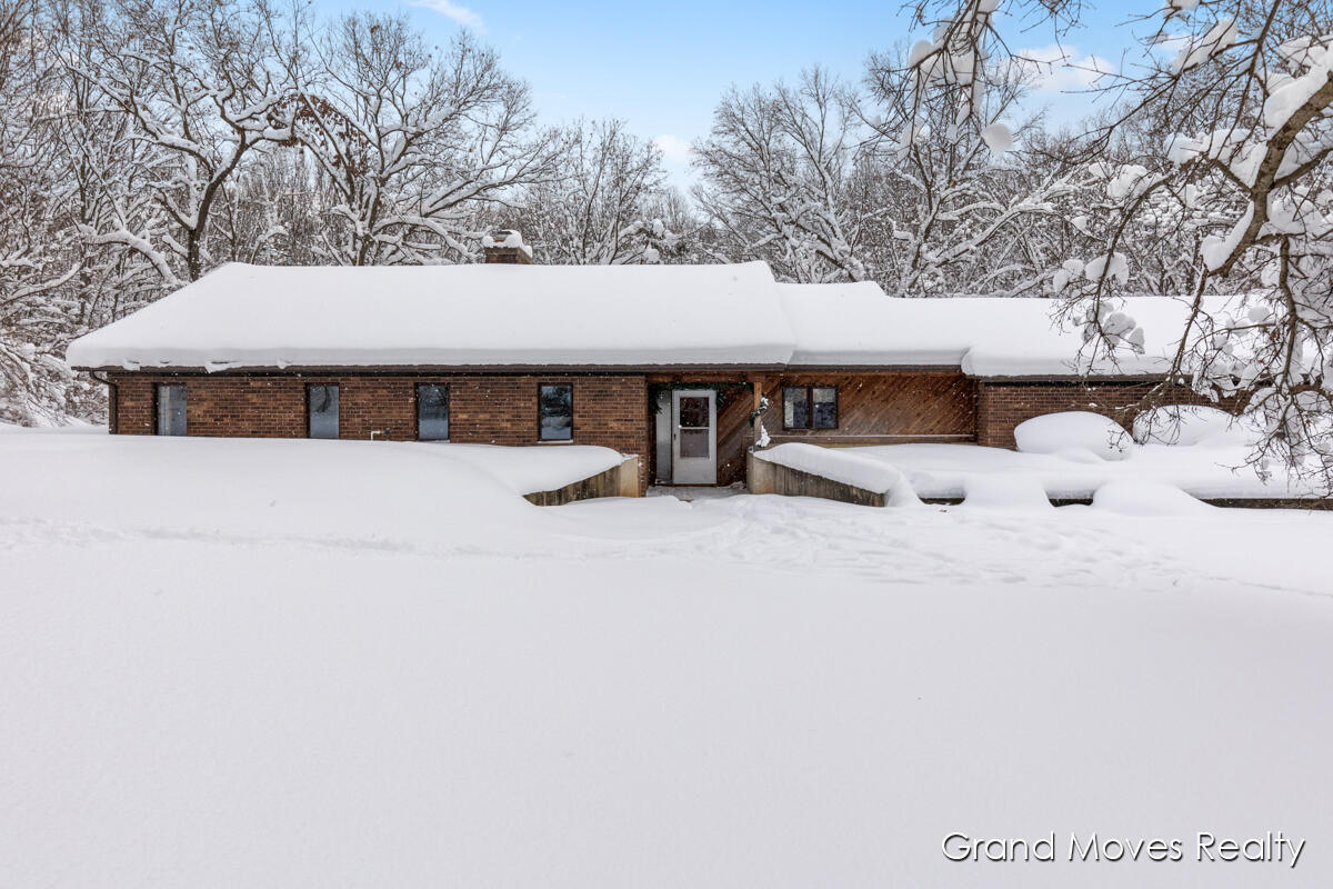 7300 4 Mile Road Northeast Ada, MI 49301 - Photo 1 of 1 Front of home facing north