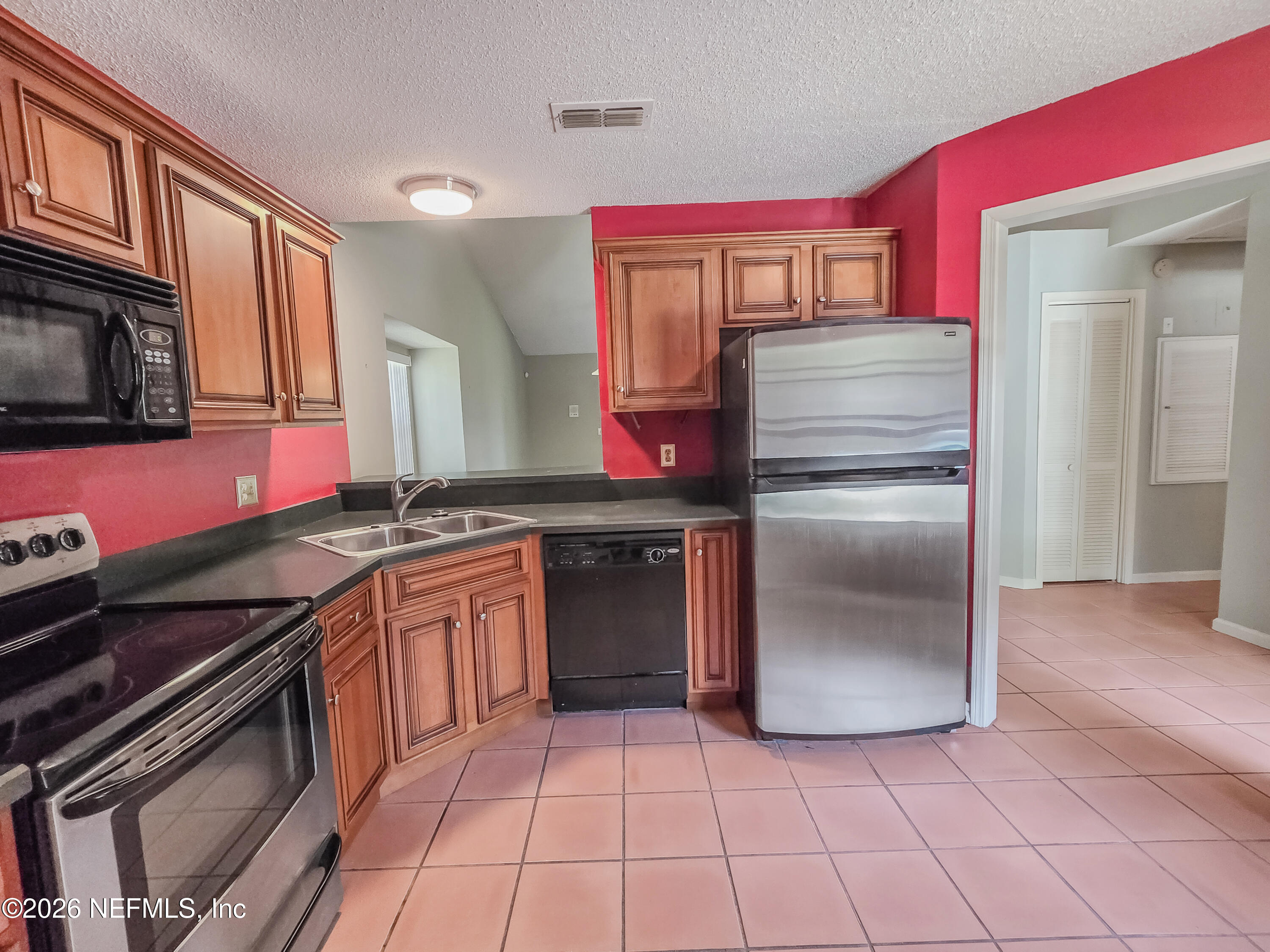 8715 Belle Rive Boulevard, Unit 1501 Jacksonville, FL 32256 - Photo 9 of 23 Kitchen