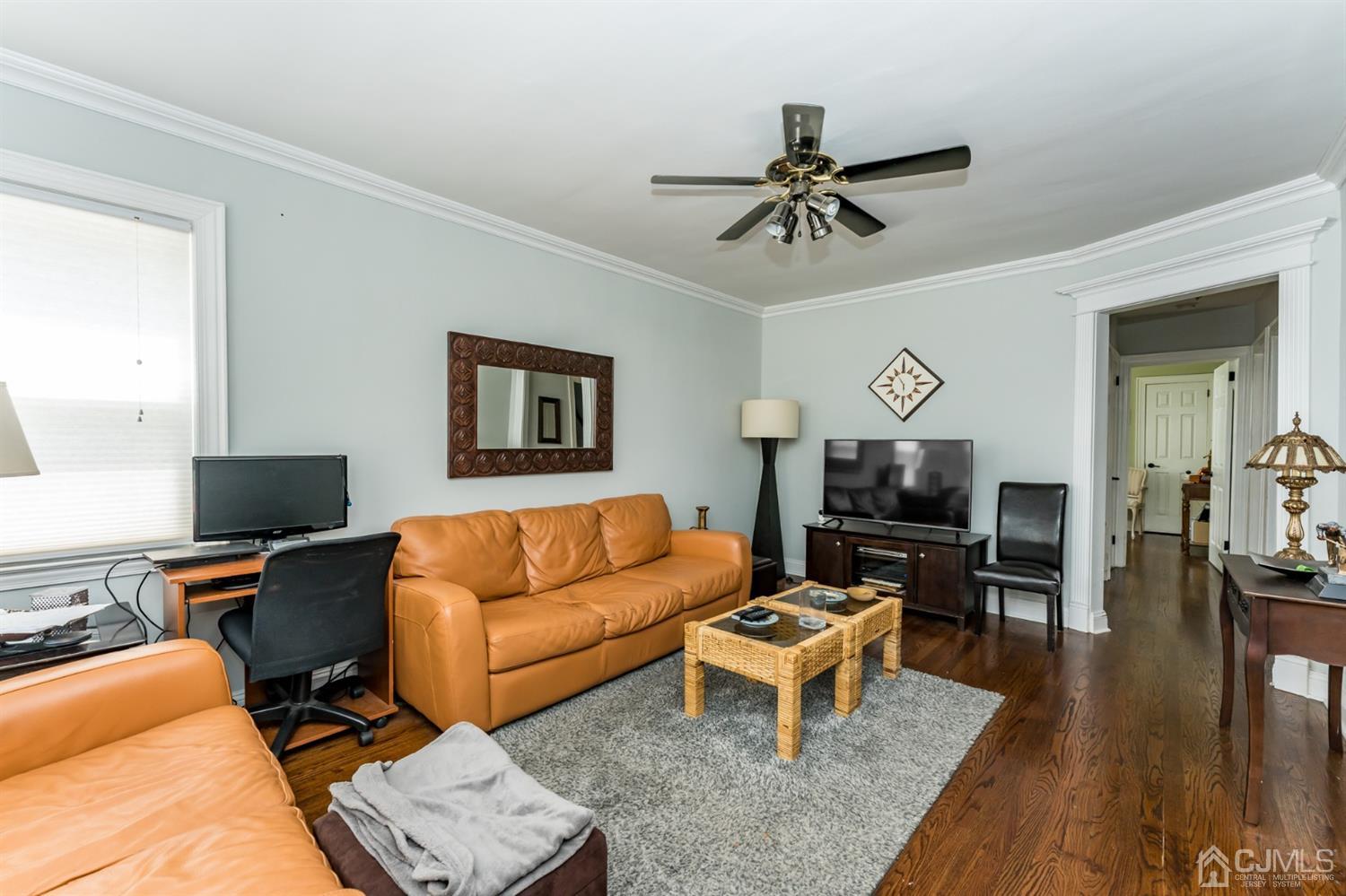 226 Hillside Road Linden, NJ 07036 - Photo 3 of 31 a living room with furniture and a flat screen tv