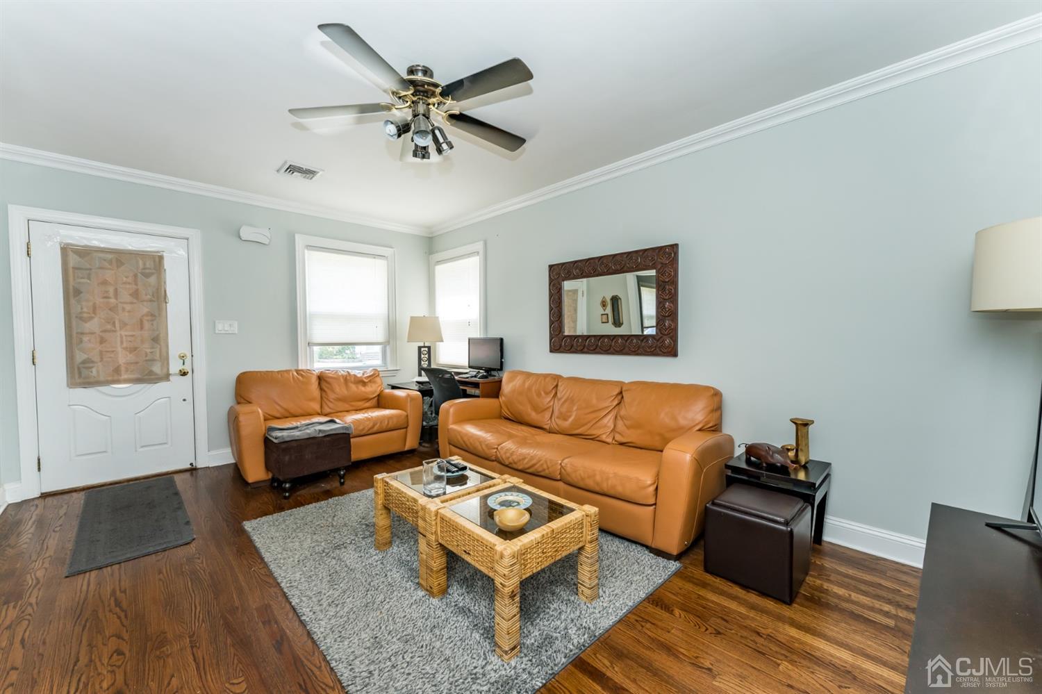 226 Hillside Road Linden, NJ 07036 - Photo 4 of 31 a living room with furniture and a rug