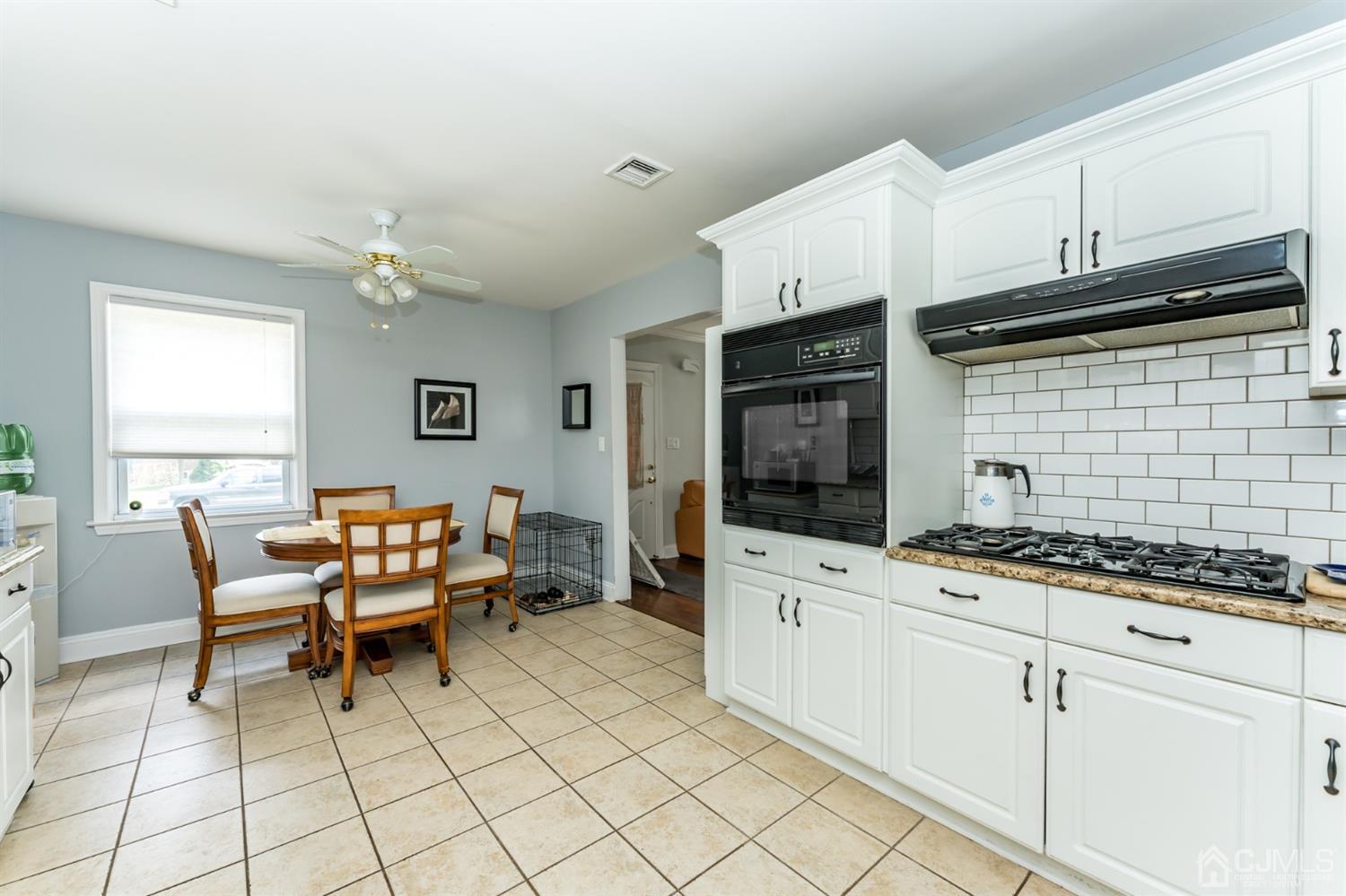 226 Hillside Road Linden, NJ 07036 - Photo 8 of 31 a kitchen with stainless steel appliances kitchen island granite countertop a sink and cabinets