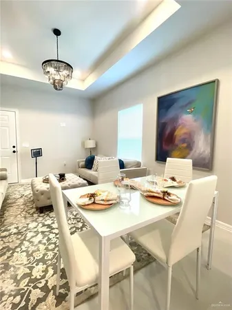 a view of a dining room with furniture