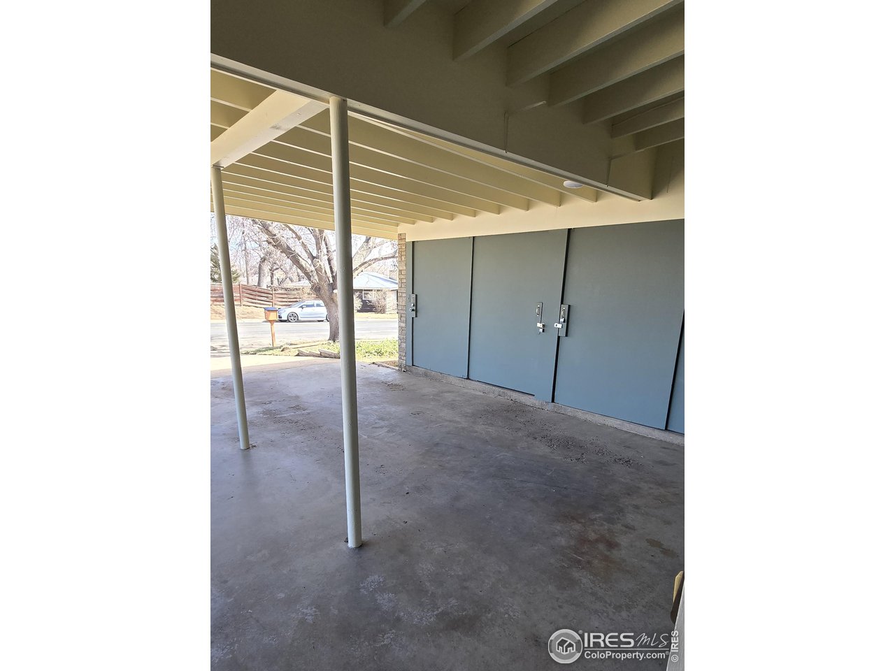 613 Skyline Drive Fort Collins, CO 80521 - Photo 19 of 19 a view of a livingroom with wooden floor and a window