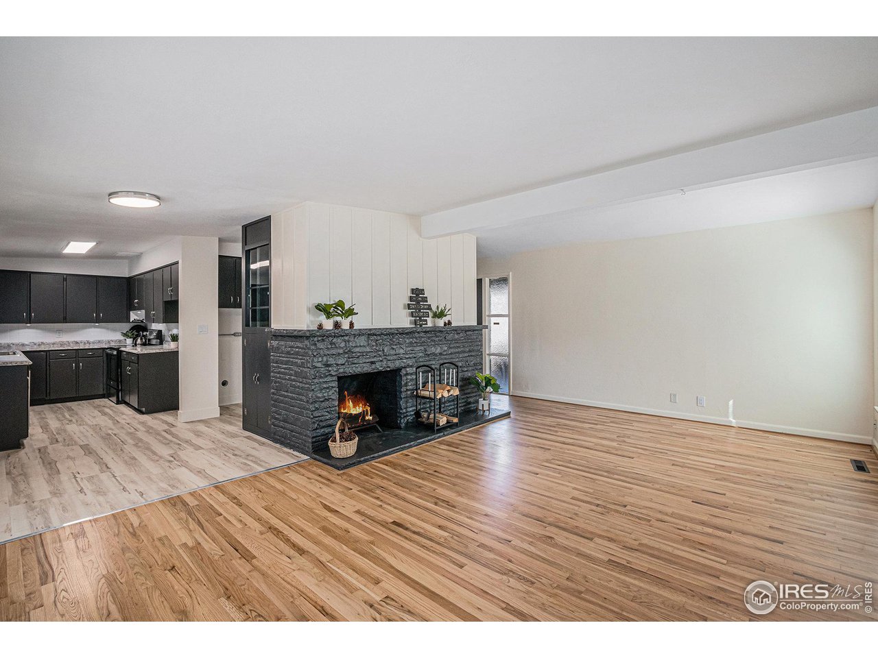 613 Skyline Drive Fort Collins, CO 80521 - Photo 5 of 19 a view of kitchen with furniture and wooden floor