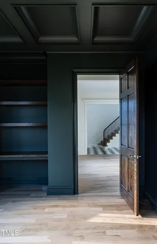 a white tub sitting in a bathroom next to a window