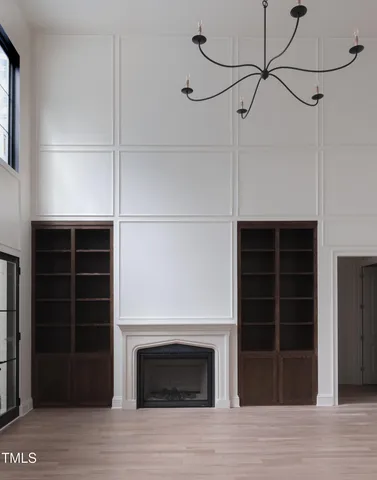 a view of kitchen with granite countertop cabinets and a stove