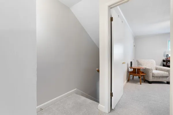 a spacious bedroom with a bed and window