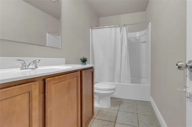 a bathroom with a sink toilet and vanity