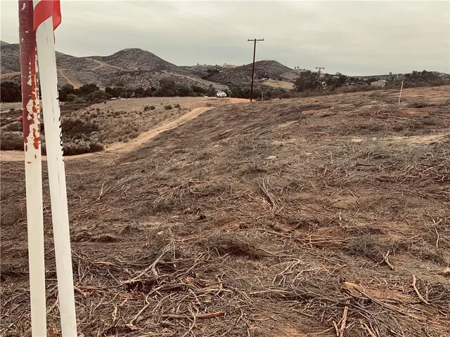 a view of ocean with mountains in the background