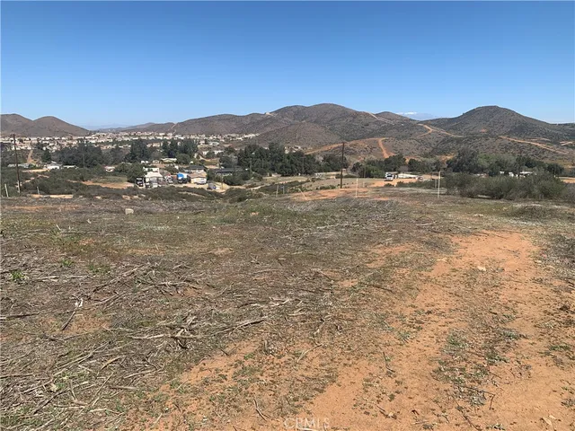 a view of a lake with mountains in the background