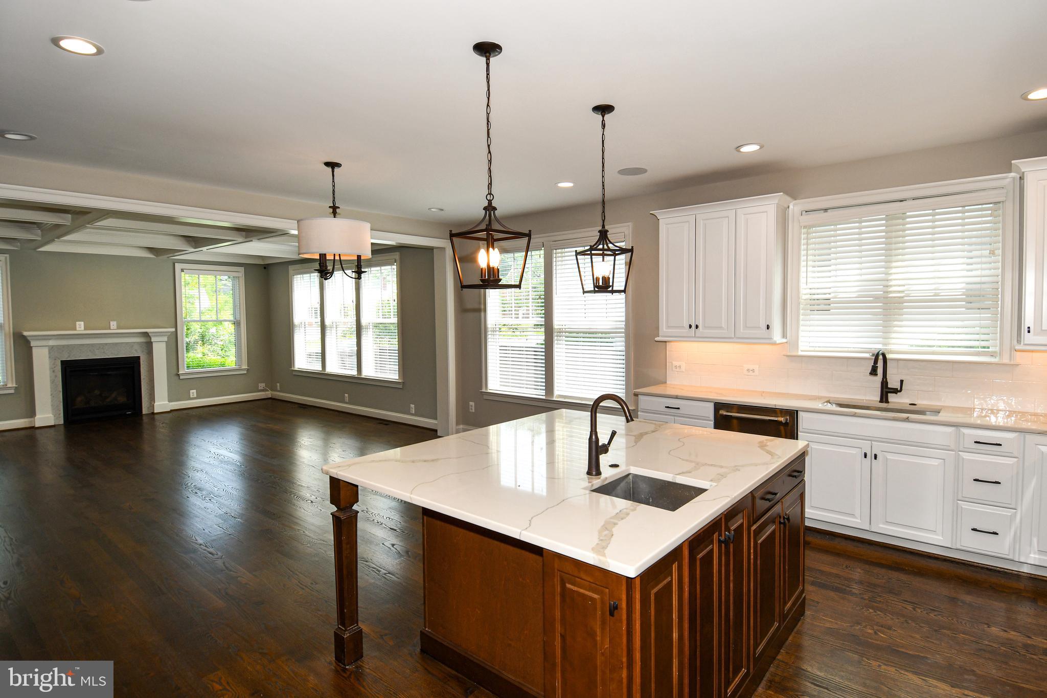 497 North Abingdon Street Arlington, VA 22203 - Photo 19 of 64 a kitchen with a counter space sink and cabinets